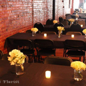 Wick's Pizza in New Albany Upstairs Party Room, flower arrangements done by Schulz's Florist