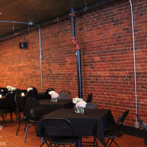 Wick's Pizza in New Albany Upstairs Party Room, flower arrangements done by Schulz's Florist