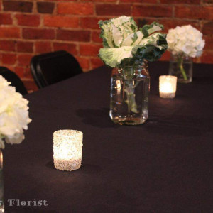 Wick's Pizza in New Albany Upstairs Party Room, flower arrangements done by Schulz's Florist